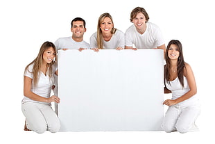 three women and two men in white top smiling for photo